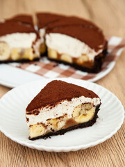 Banoffee pie, banana and caramel with biscuit and fresh cream