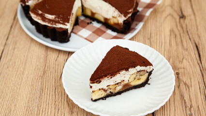 Banoffee pie, banana and caramel with biscuit and fresh cream