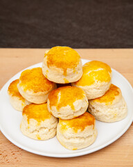 Homemade British Scones with clotted cream and raspberry jam 