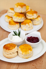 Homemade British Scones with clotted cream and raspberry jam 