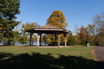 Beautiful gazebo sitting in the middle of a park at the Green Lane reservoir. I love the look of all the trees around it changing colors of their leaves to pretty Fall brown. 