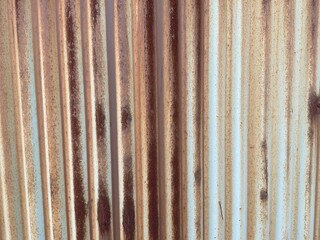 A rusty tin wall near the sea
