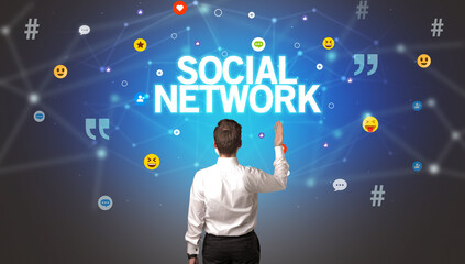 Rear view of a businessman, social media concept