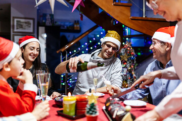 Hispanic latin multi generational family celebrating christmas at home - New year eve and xmas holidays