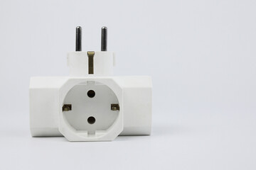 A white three way electric plug,isolated on white background