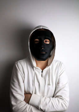 white person with black mask