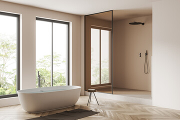Fototapeta na wymiar Corner view on bright bathroom interior with bathtub, panoramic windows