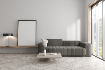 Bright living room interior with sofa, empty white poster