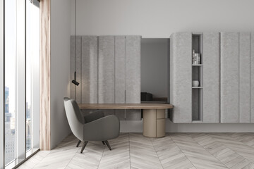 Light living room interior with workplace and shelf, panoramic window