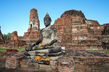 Ruins of pagodas, monks and walls that remain of Wat Mahathat, Ayutthaya, Thailand, which were...