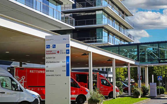 Düsseldorf (UKD), Germany - Juin 9. 2022: Central emergency department of university hospital with red  rescue ambulance trucks