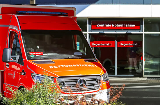 Düsseldorf (UKD), Germany - Juin 9. 2022: Central emergency department of university hospital with red  rescue ambulance truck