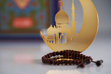 decoration metal crescent mosque prayer beads and holy book koran