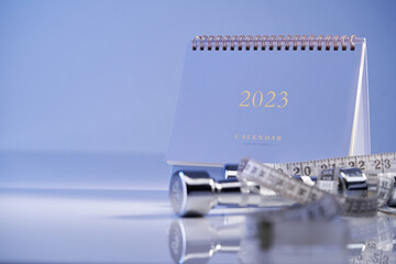 desk calendar 2023 with dumbbell and  tape measure