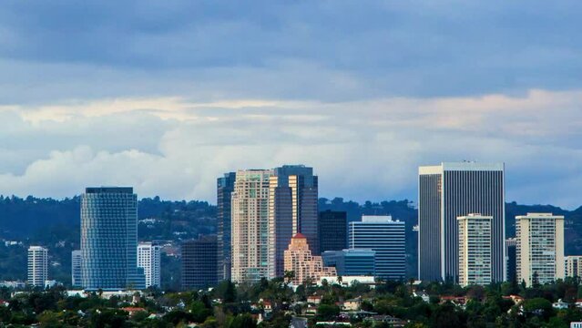 Lockdown Time Lapse Shot Of Tall Buildings Against Cloudy Sky In City - Los Angeles, California