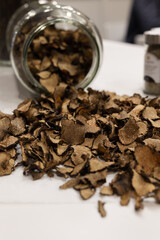 Light, Thin Truffle Flakes Sticking out of a Glass Container
