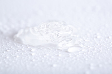 Hyaluronic acid or collagen gel close up. Textured background with oxygen bubbles in cosmetics. Moisturizing serum for the skin.