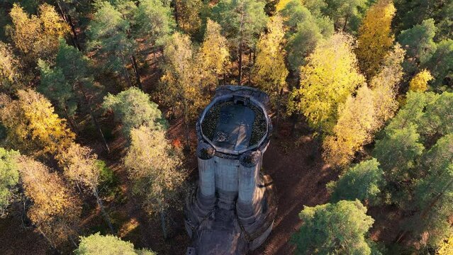 Rajamaki air defense tower in Nurmijarvi, Finland. Beautiful autumn color forest.