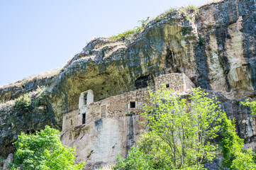 The panorama of the Hermitage of San Bartolomeo in Legio built with stones and carved into the rock