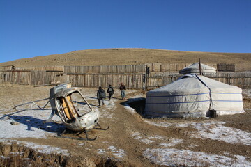 The Mongol gers (tents), kids, and the mini helicopter wreck in Chingeltei valley, Ulaanbaatar,...