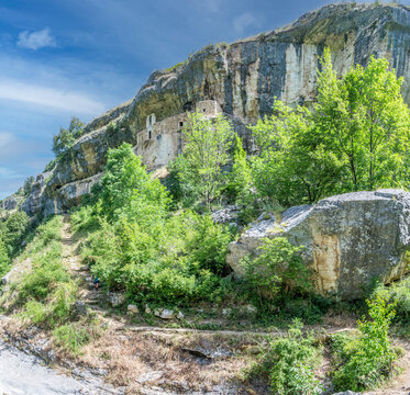 The panorama of the Hermitage of San Bartolomeo in Legio built with stones and carved into the rock
