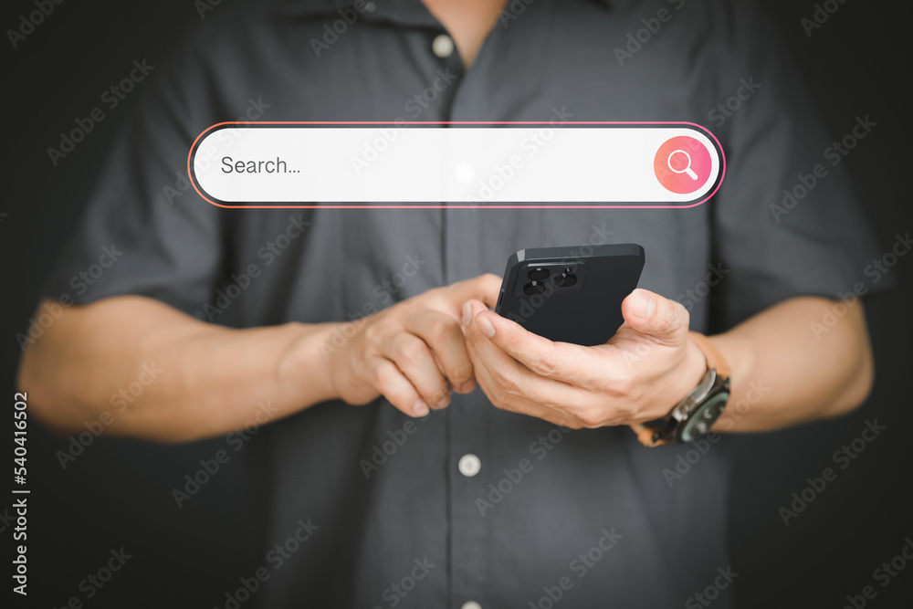 Poster Man using a mobile phone in the room for searching browsing internet data information. Business concept for smartphone using search with your website.