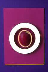 delicious healthy fresh pink cut mango in nice light in round frame on color background, top view