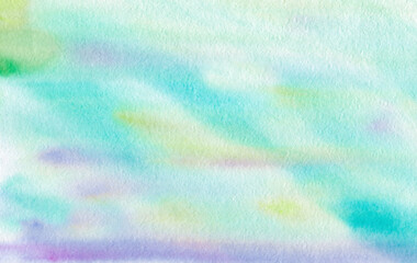 Abstract watercolor background. Delicate shades of green and blue on watercolor paper. Picturesque spots of paint.