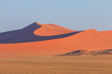 Plakat Dunes in the Namib-Naukluft National Park of Namibia.
