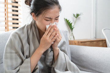 young woman coughing  and flu at home
