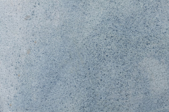 Calzite azul extra, natural marble stone texture, photo of slab. Light blue matt Italian stone pattern for interior, exterior home decoration, floor tiles and ceramic wall tiles, wallpaper surface.