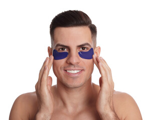 Fototapeta premium Man applying blue under eye patch on white background