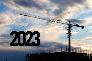 Concept for New Year 2023 for marking and construction plans. Future planning and goals. Silhouette...