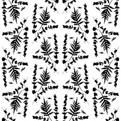 Boho seamless pattern with black eucalyptus and palm leaves on white background.