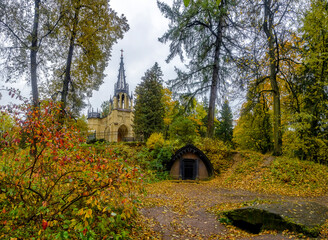 Neogothic church of Peter and Paul in Shuvalovsky park in St. Petersburg in cloudy autumn weather.