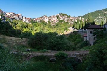 Fototapeta na wymiar Dimitsana village with the old three-arch bridge of Makris in Arcadia, Greece