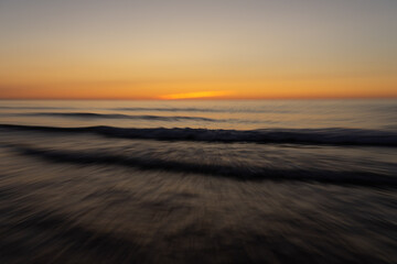 Abstract landscape on a beach at sunset