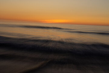 Fototapeta na wymiar Abstract landscape on a beach at sunset