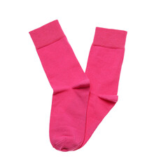 Pink socks on white background, top view