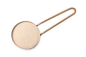 Granulated yeast in scoop isolated on white, top view