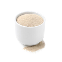 Granulated yeast in bowl on white background
