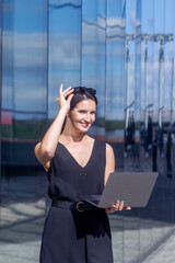 Fototapeta premium Business woman work on laptop computer at outdoor