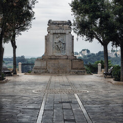 Fototapeta na wymiar LOCOROTONDO, ITALY - OCTOBER 13, 2019: War memorial commemorating dead of first world and 2nd world war 