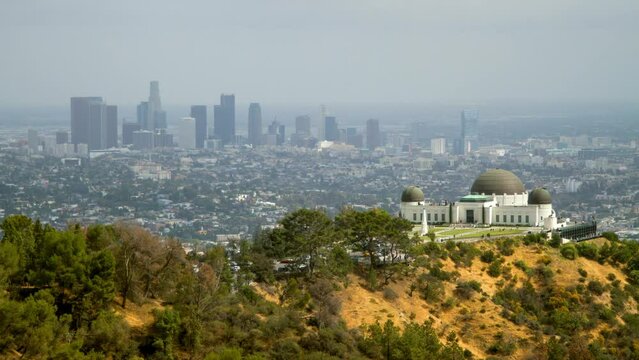 Time Lapse Lockdown Shot Of Tourists At Griffith Observatory On Mountain In City - Los Angeles, California