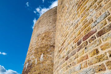 Obraz premium Detailed textured surface of an exterior wall of a Martello tower located on the east coast of England. The tower is used as a holiday home.