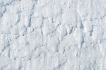 Background of fresh snow, blue shadows