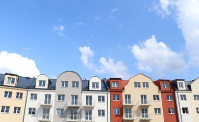 Fototapeta na wymiar Beautiful view of modern houses against blue sky