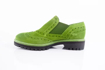 Fotobehang Female green leather shoes pares on white background, isolated product. © GeorgeVieiraSilva