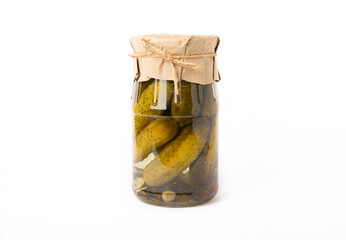 Jar of pickled gherkins isolated on white background. Side view.
