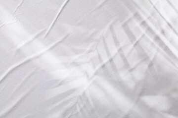 Fototapeta premium Gray beige crumpled wet craft paper blank texture copy space light and shadow background.